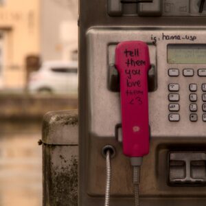 Phone booth reminding you to tell someone you love them
